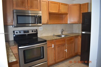 Three Horizons North unit 304, North Miami, FL 33161 - photo 2