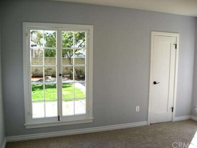 3rd Bedroom with View of Landscaped back yard and 