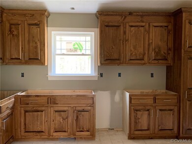 1002 Eubanks Rd, Dunnsville, VA 22454 - photo 4