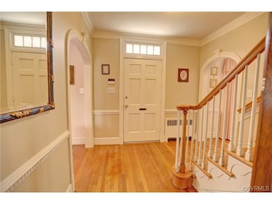 Tons of charm! Arched entrance ways to Living and 
