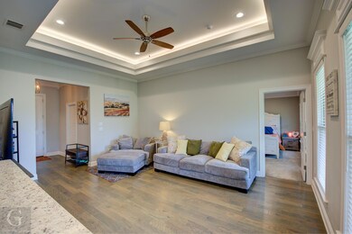 Living room featuring dark hardwood / wood-style f