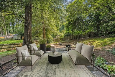 Step Outside to your Fully Fenced Backyard with a Dedicated Fire Pit Area ideal for cool nights under the stars.