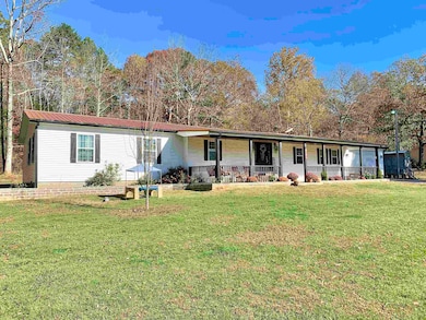 View of front of house featuring a front lawn and 