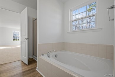 Primary bedroom en-suite bathroom with double vani
