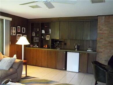 Family Room. One end of family room is equipped wi