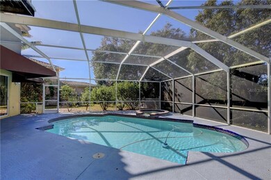 Pool, spa and covered patio all within a screened 