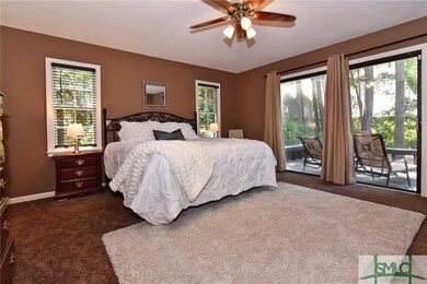 Master bedroom with golf course view and opens up 