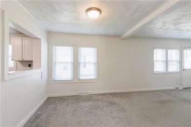 The kitchen is open to the living area