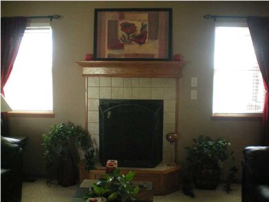 ENTERING LIVING ROOM WITH WINDOWS FLANKING EITHER 