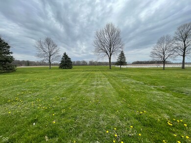 view of yard featuring a rural view and a water view