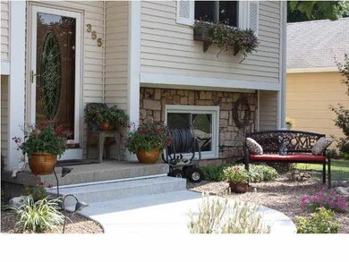 New concrete and lush landscaping welcomes you to 