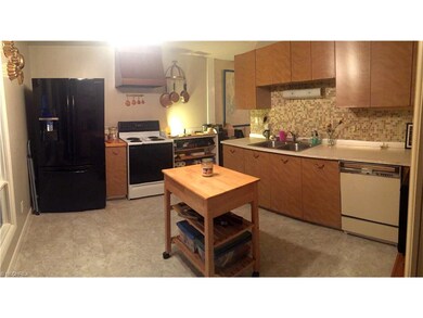 All Appliance Kitchen opens to Four Season Room.