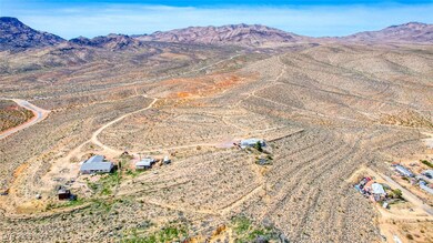 Drone / aerial view featuring a mountain view, a d