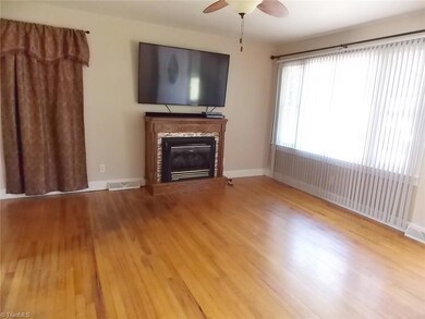 Living Room Fireplace with Gas Logs