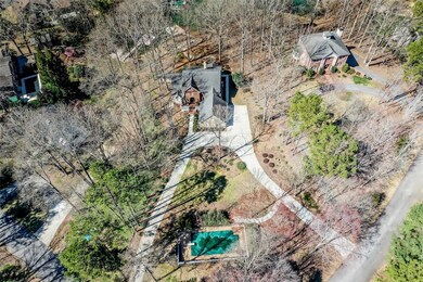 Circular driveway and pool.
