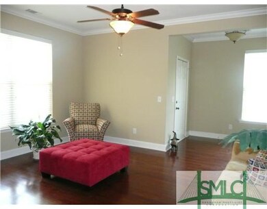 Living Room. FORMAL LIVING ROOM FEATURES WOOD FLOO