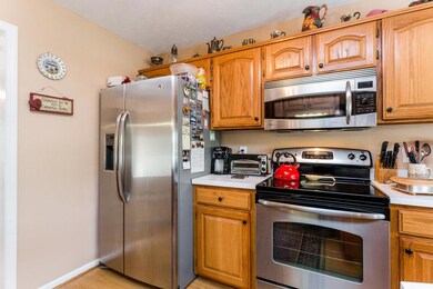 New stainless steel appliances stay with the home.