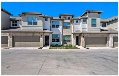 Multi unit property featuring an attached garage 
