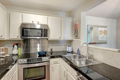 Updated kitchen with stainless steel appliances, g