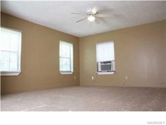 Roomy living room with window unit.....this one un