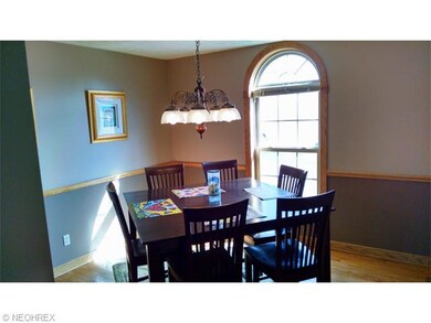 Dining Room with hardwood floors.