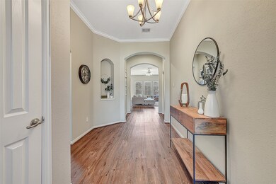 Welcoming entry with gorgeous vinyl wood flooring!