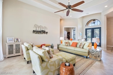 Living area with recessed lighting, a ceiling fan,