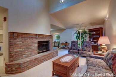 Living room with massive brick fireplace
