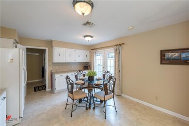 Large eat in kitchen with plenty of countertops.  
