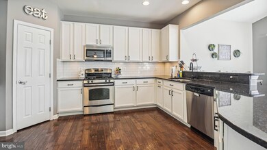 9479 Merrimont Trace Cir, Bristow, VA 20136 - photo 4