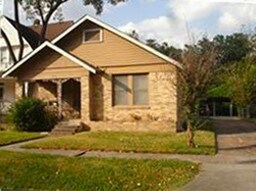 The home in front of  the garage apartment.