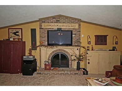 Living Room. Vaulted ceiling and built in cabinets