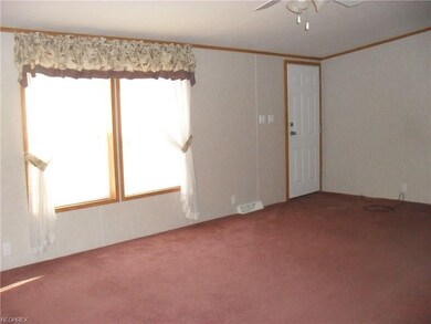 Living Room with Natural light shining through dou