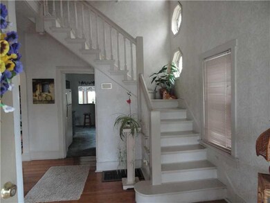 Entry/Foyer. Inviting foyer with charming staircas