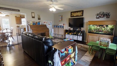 Huge living room with gorgeous new dark hardwood floors!