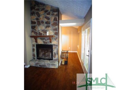 Other. Tall wood burning stone fireplace