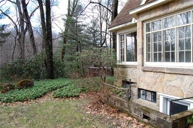 Side View - Basement area access to a half bathroo