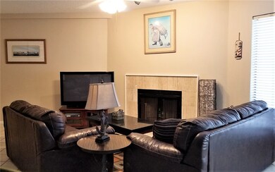 Living room with fireplace.