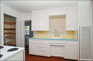 Original vintage Kitchen with large pantry closet