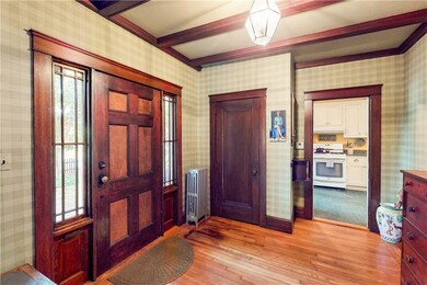 Large coat closet behind mahogany door.  These hig