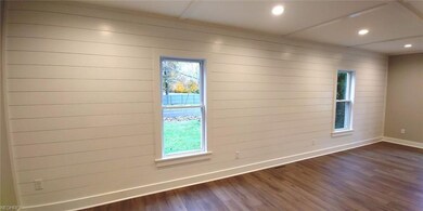 Ship lap feature wall spans the LR/DR area