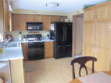 Kitchen. New Pergo flooring in kitchen.