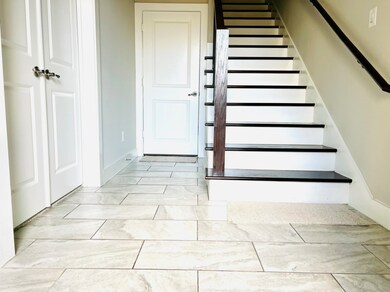 Tile flooring. suite 1 is on the left with a doubl