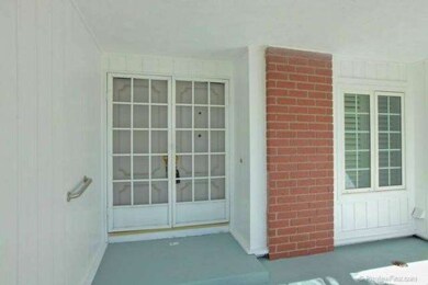 Covered front entrance with double doors, new exte