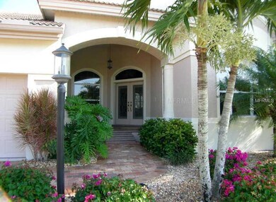 Entrance - Appealing entry with double-doors, retractable screens.