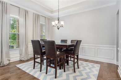 Front formal dining room has upgraded crown moulding and picture moulding.