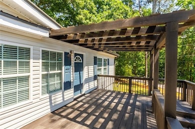 Wooden terrace with a pergola