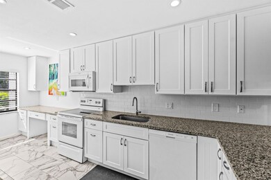 34 Southport Ln unit E, Boynton Beach, FL 33436 - photo 4