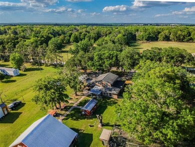 Aerial view behind main home