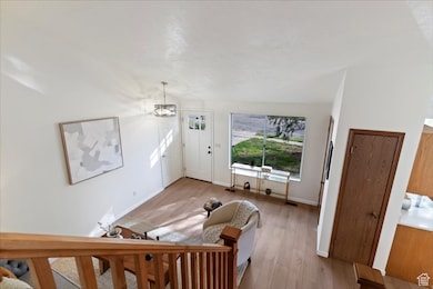 Living room featuring wood finished floors and baseboards